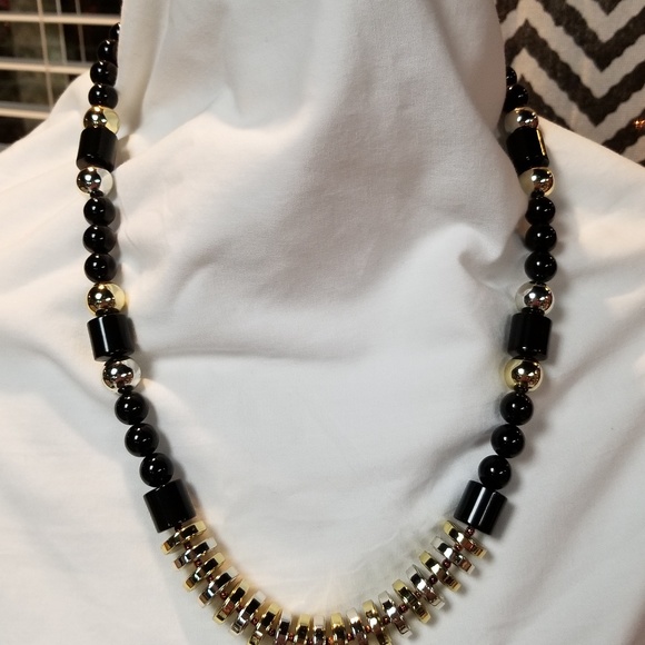 Jewelry - Gold, black and silver necklace.